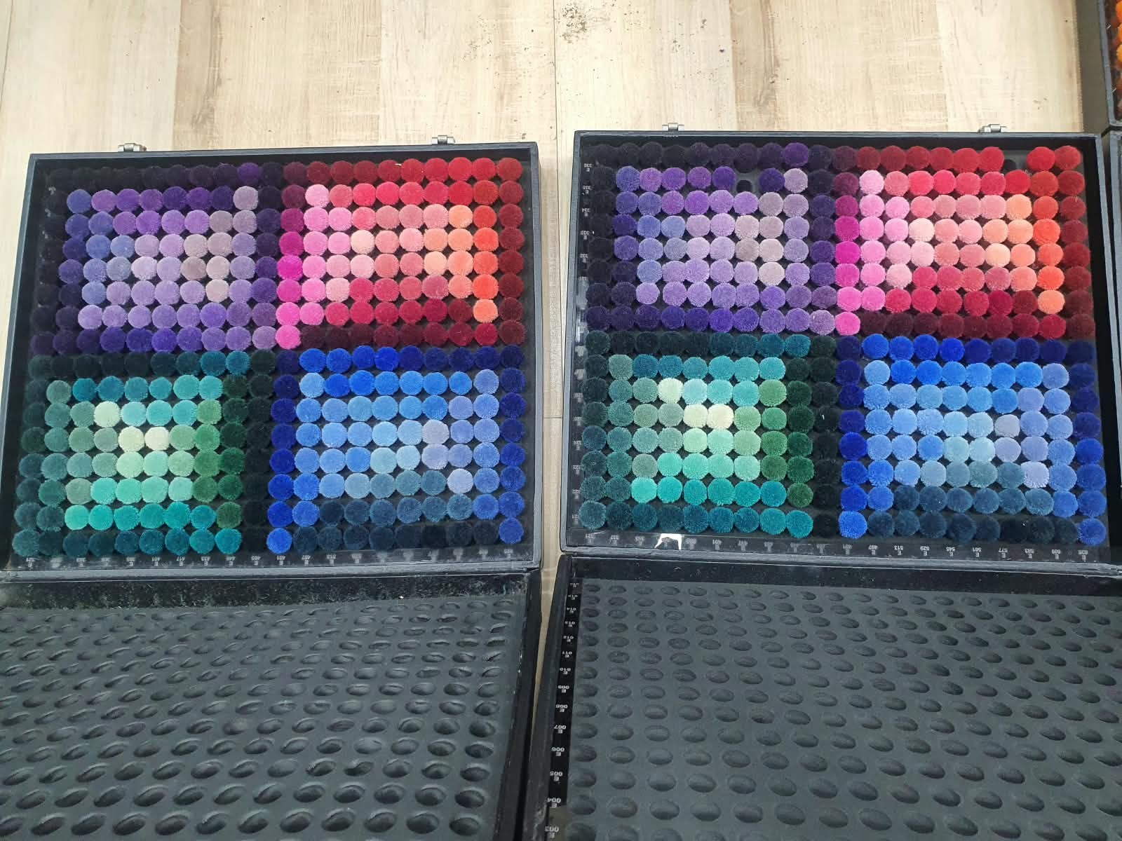 Open yarn colour sample cases at Alfombra India